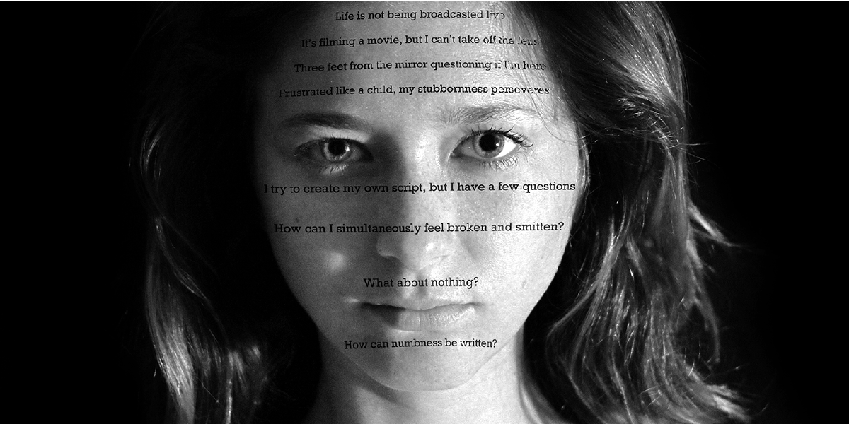 black and white photo of woman's face with writing superimposed